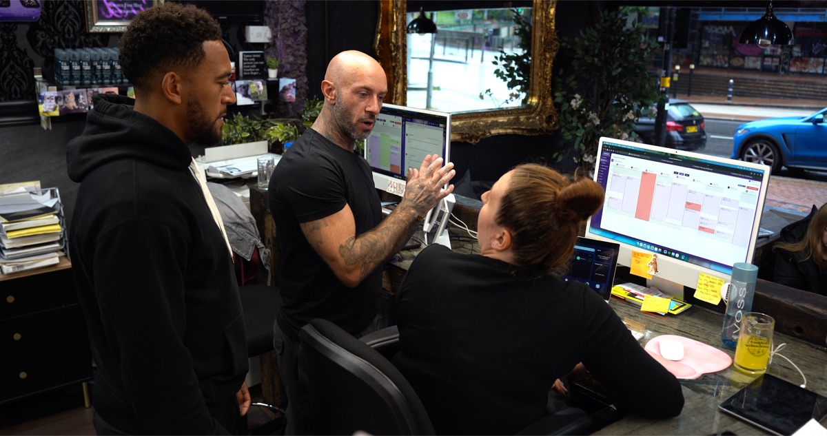 Andy mentoring at the computer